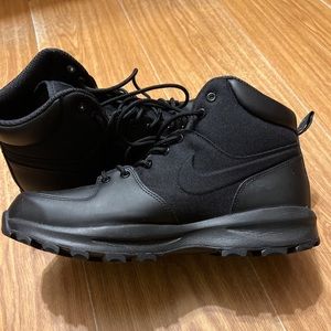 All black Nike boots